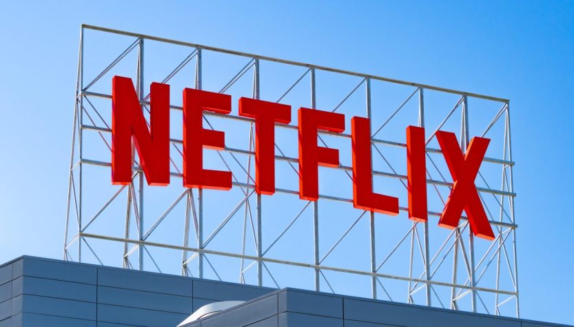 Why did Netflix retract its agreement to purchase Warner Bros.?