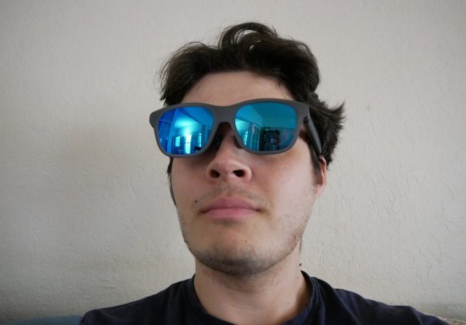 Is wearing sunglasses the optimal method for viewing a film?